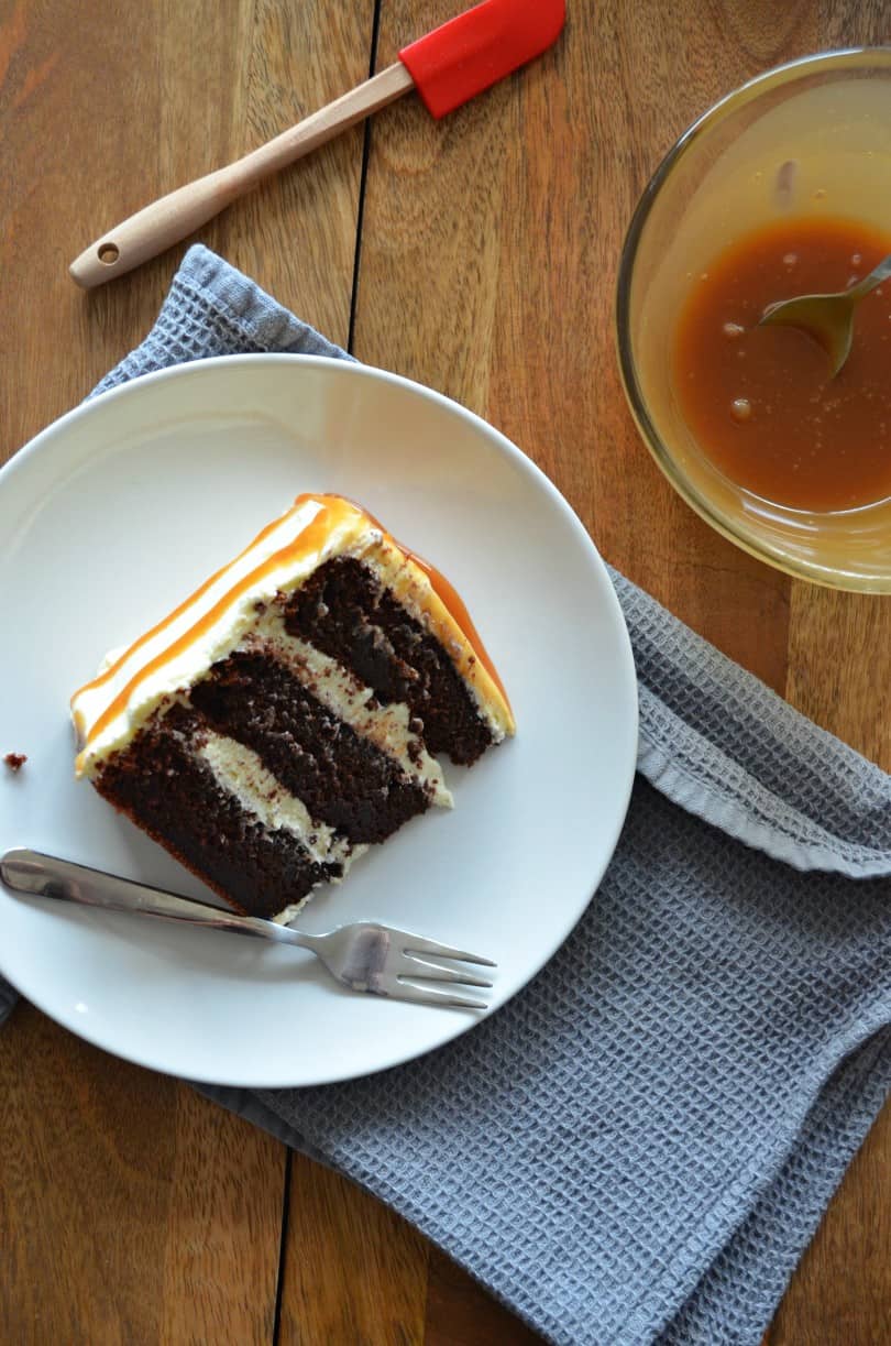 chocolate-layer-cake-vanilla-frosting-salted-caramel-drizzle