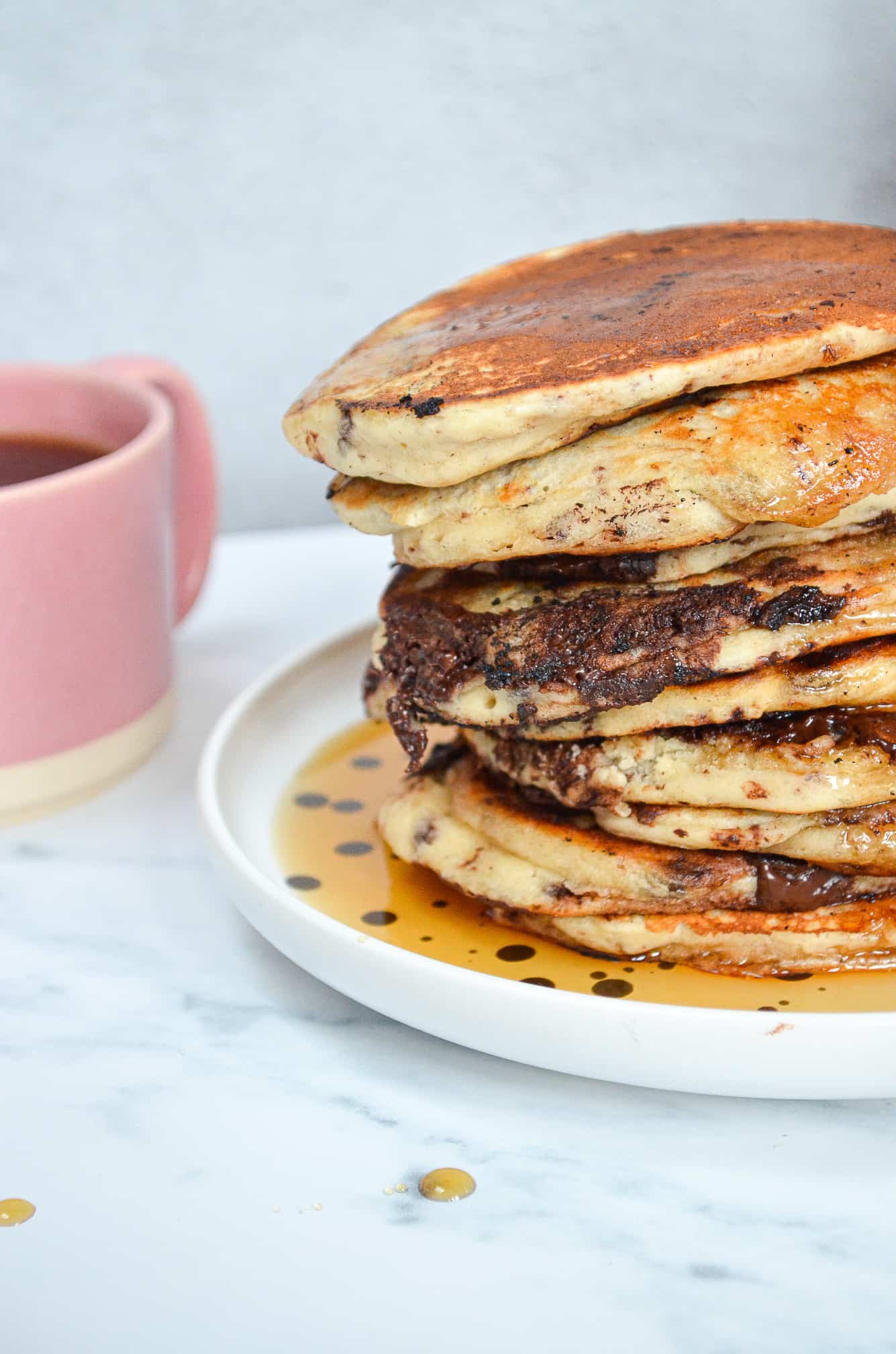 close up shot of stack of vegan chocolate pancakes