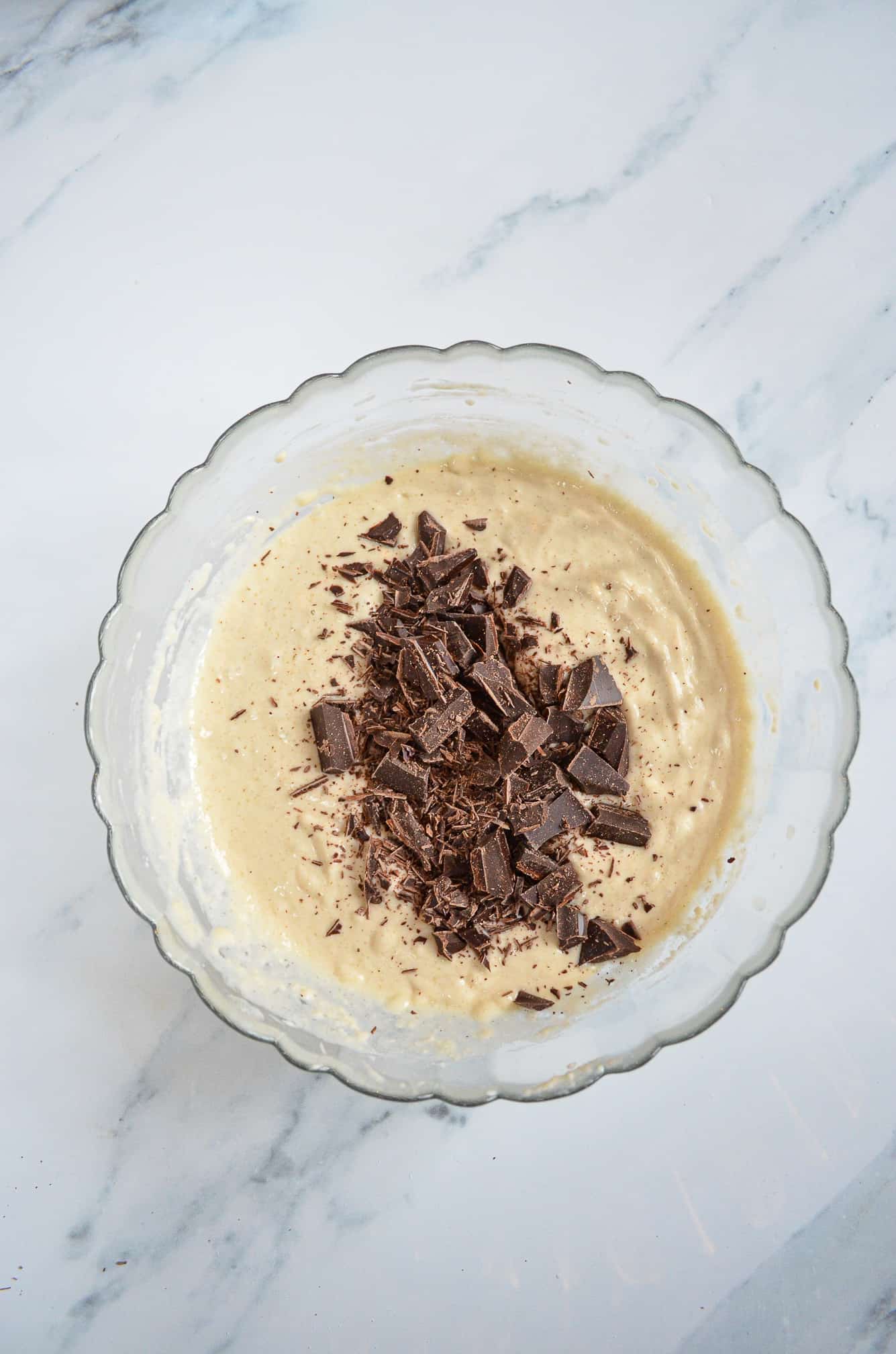chocolate chunks in vegan pancake batter in bowl