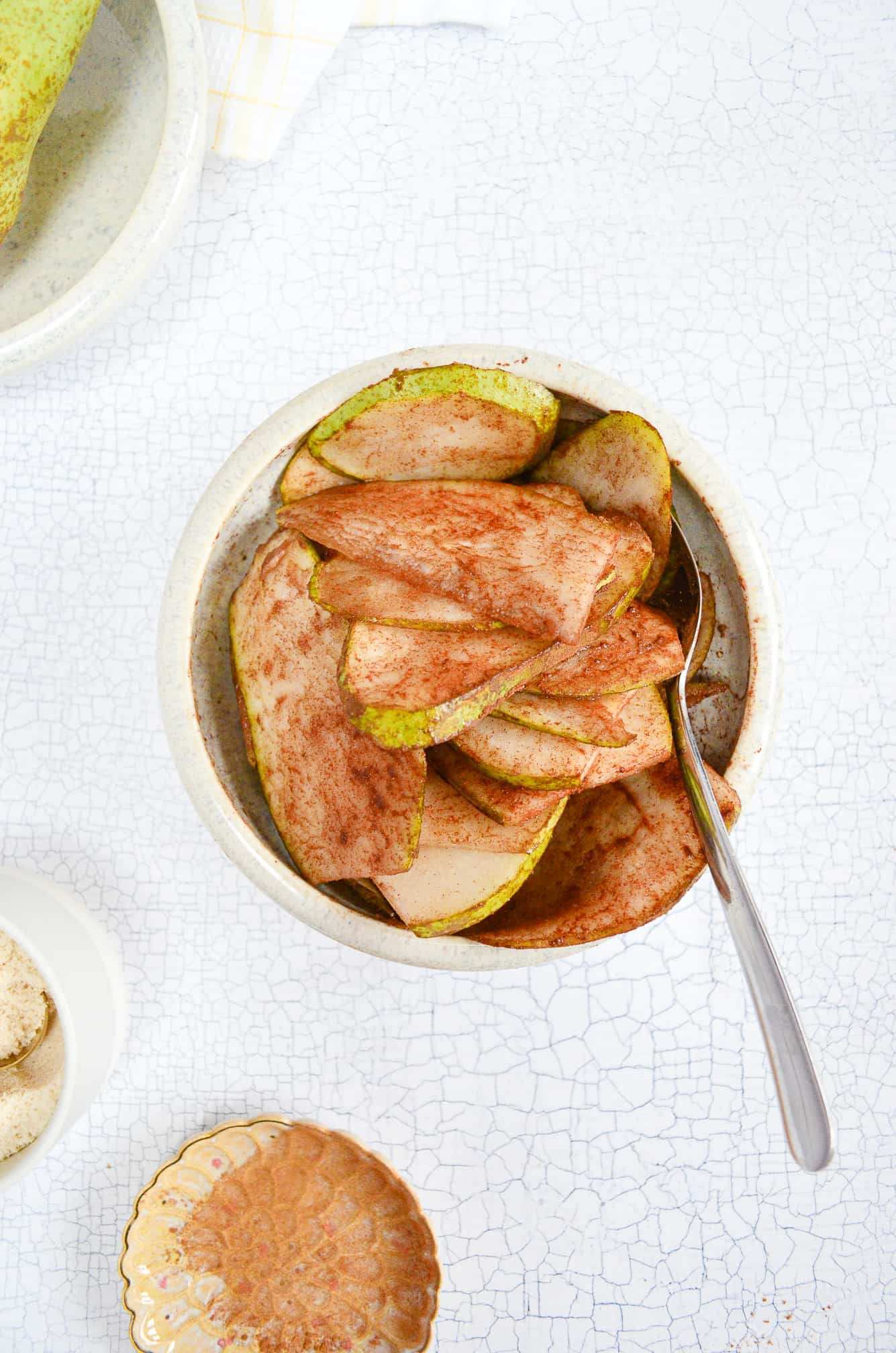 honey cinnamon sliced pears in a bowl