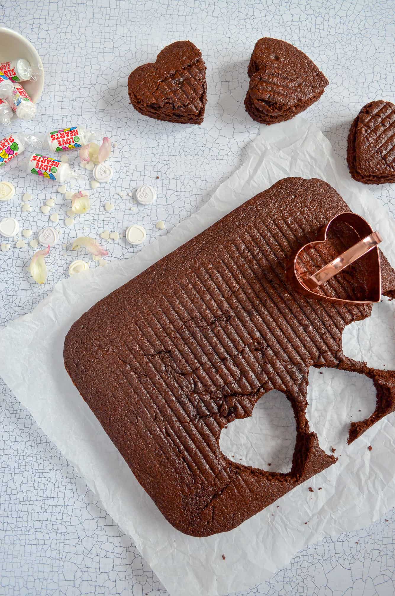 chocolate cake hearts cut out of traybake